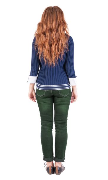 back view of standing young beautiful redhead woman. - Foto, afbeelding