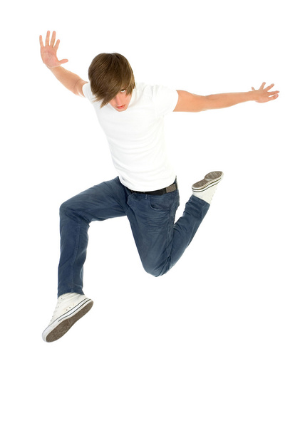 Молодой человек прыгает
 - Фото, изображение