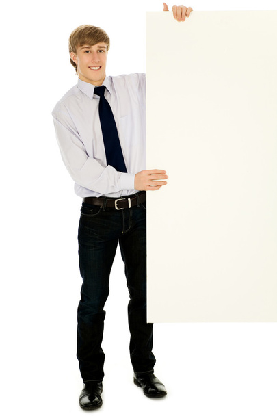 Businessman holding blank poster - Фото, зображення