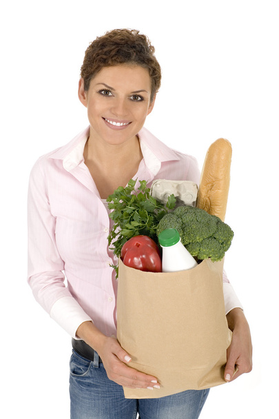 Woman holding grocery bag - Fotó, kép