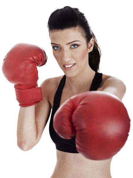Nainen nyrkkeilijä antaa lyönti
 - Valokuva, kuva