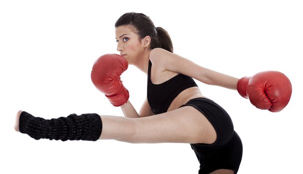 Kickboxing menina dando forte pontapé
 - Foto, Imagem