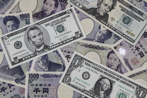 Banconote americane e Yen assortite
 - Foto, immagini