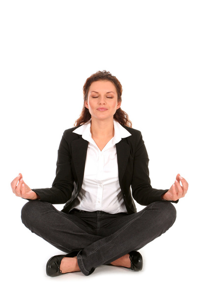 Woman sitting in lotus position - Photo, Image