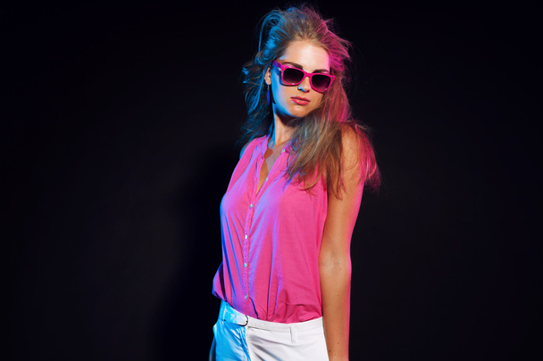 Sexy retro 80s fashion disco girl with long blonde hair and sung - Foto, afbeelding