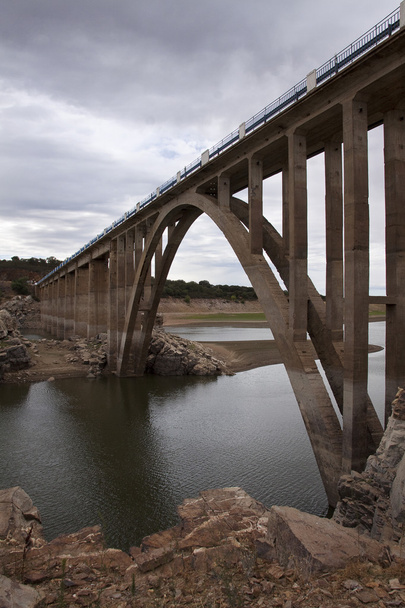 Stone bridge over a lake - Photo, Image