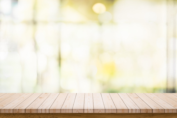 Empty wooden table with blur living room interior background. - Photo, Image