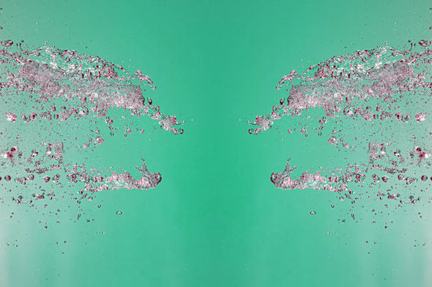 Symmetrisch patroon van gestopte waterdruppels met transparante s - Foto, afbeelding