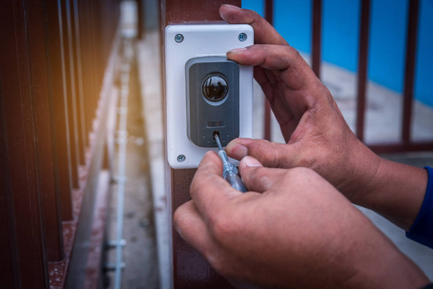 Motion sensor installed to control gate for home security system . - Fotografie, Obrázek