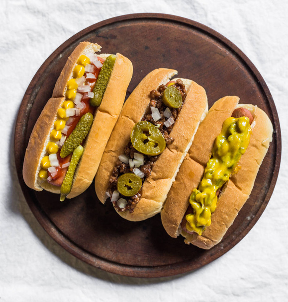 Selection of classic hot dogs against white background - Photo, Image