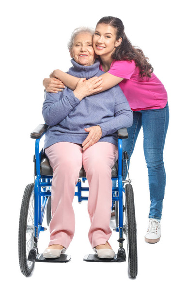 Happy woman with grandmother on white background - Photo, Image