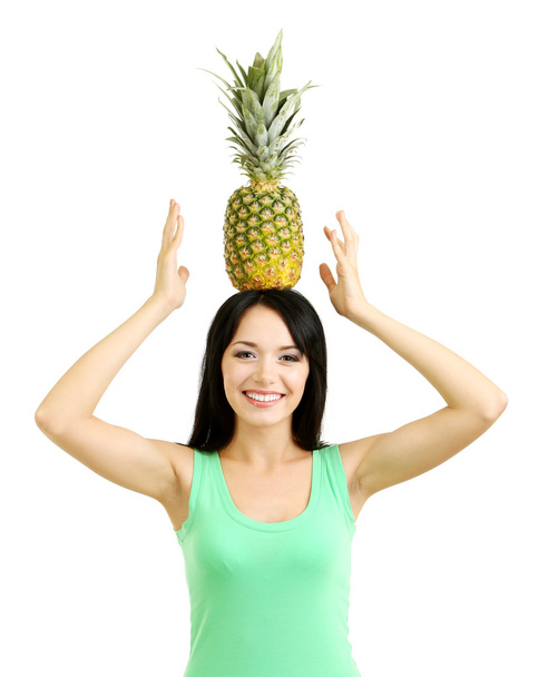Girl with fresh pineapple isolated on white - Foto, afbeelding