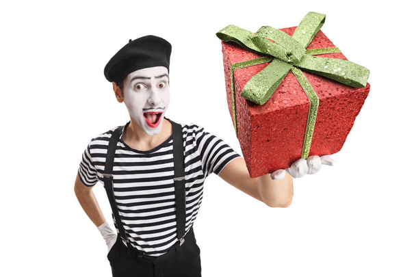Mime holding a red present box - Fotografie, Obrázek