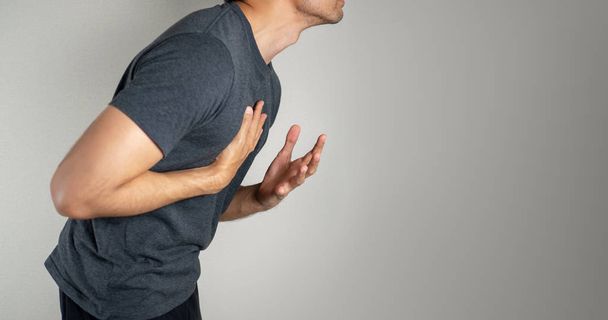 Man having a chest pain  - Фото, зображення