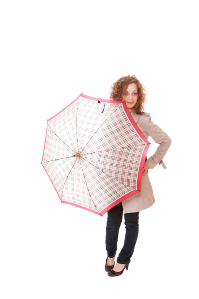 Woman holding an umbrella - Valokuva, kuva