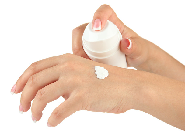 Woman applying cream on hands, isolated on white - Foto, Imagem