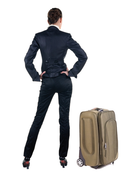 Back view of business woman with suitcase - Photo, Image