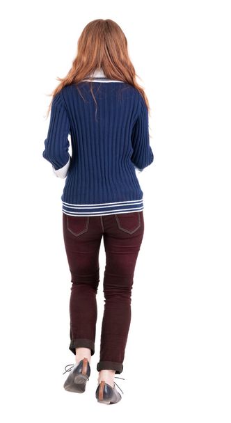 back view of jumping woman in jeans. - Foto, immagini