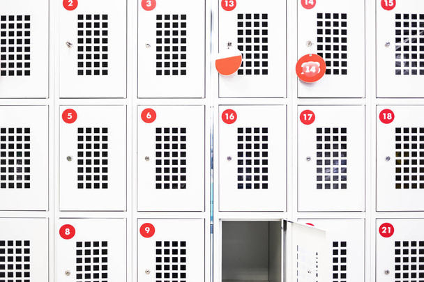 One locker is open in the supermarket. Storage lockers with rooms - Foto, afbeelding