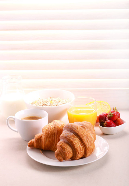Breakfast with croissant, orange juice - Photo, Image