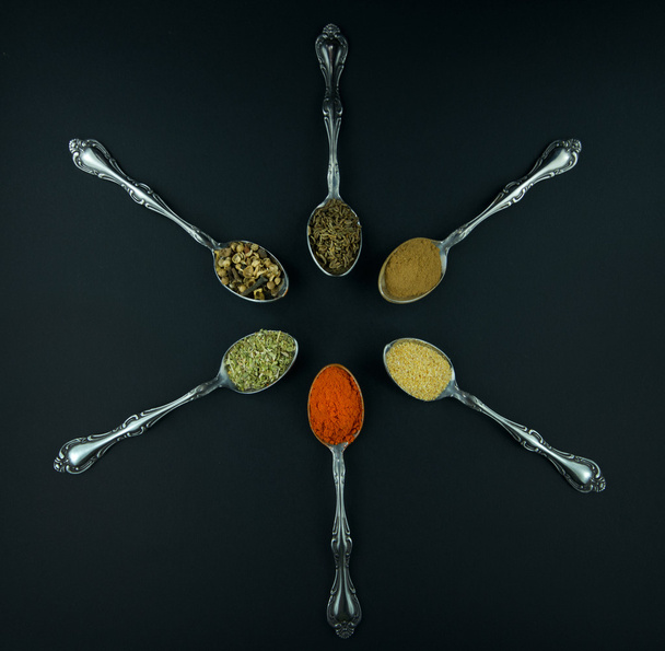 Spices in spoons - Fotoğraf, Görsel