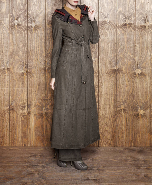 Female model in trendy cotton coat, studio shot - Photo, Image