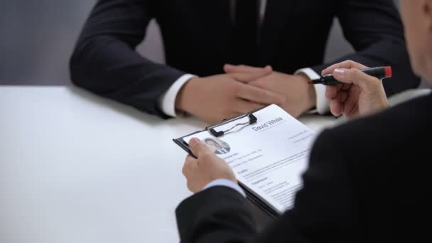 Employer crossing out candidate name in resume unsuccessful job interview result - Footage, Video