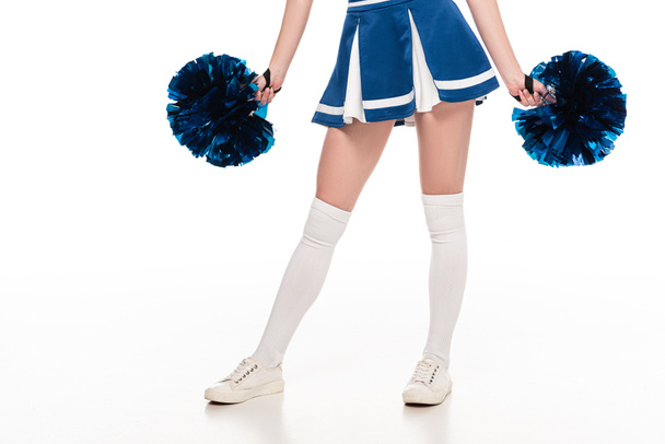 partial view of sexy cheerleader girl in blue skirt with pompoms isolated on white - Fotografie, Obrázek