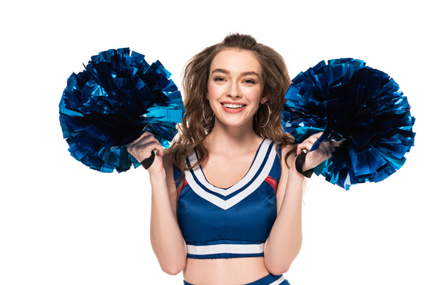 happy cheerleader girl in blue uniform dancing with pompoms isolated on white - Foto, afbeelding