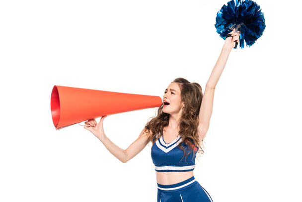 cheerleader girl in blue uniform with pompom using orange loudspeaker isolated on white - Photo, Image