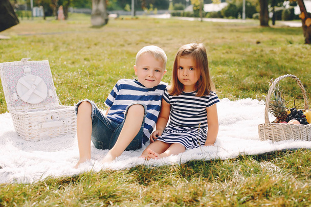 Family in a park playing on a grass - Valokuva, kuva