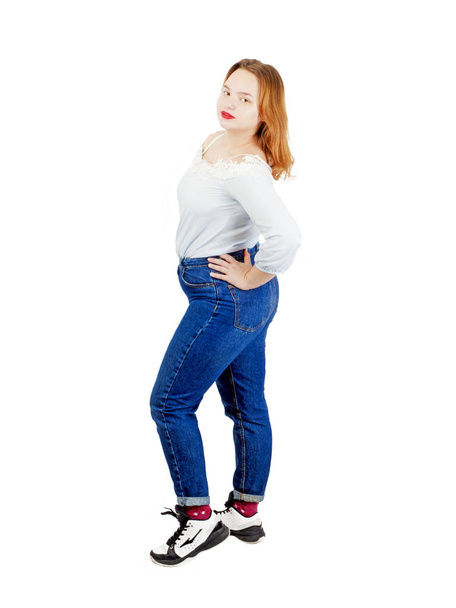 Overweight young woman, full length portrait. Isolated on white  - Photo, image