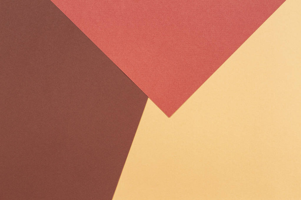Absztrakt geometrikus papír textúra karton háttér. Bézs, barna sárga pasztell trendi színek - Fotó, kép