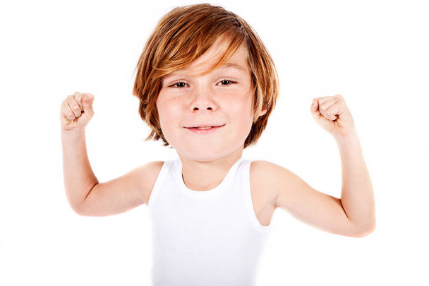 blonde boy with big head flexing his muscles - Foto, immagini