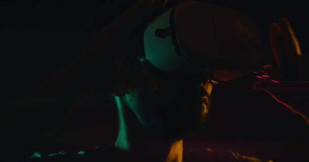 Close up shot of a male putting on a Virtual Reality Headset - Footage, Video