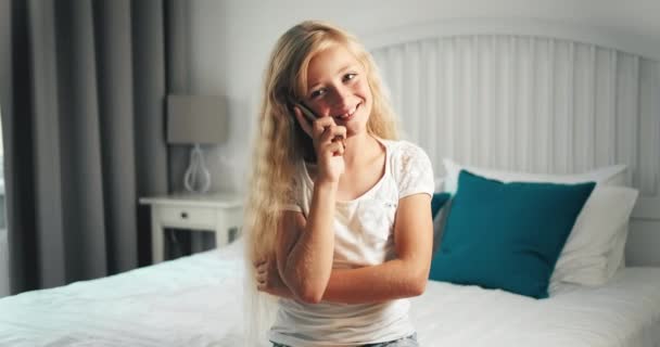 Girl Talking on Smartphone in Bedroom - Кадри, відео