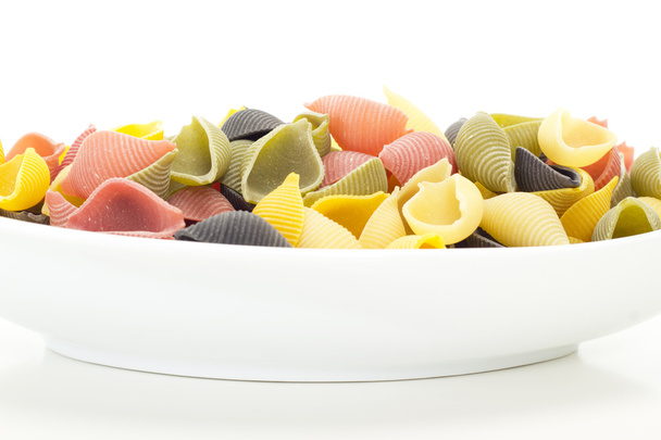 Colourful italian raw noodles waiting to be cooked - Photo, Image