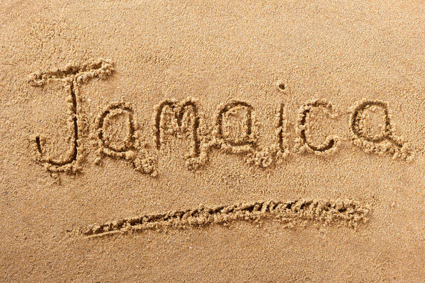 Jamaica beach sand sign message - Foto, Bild