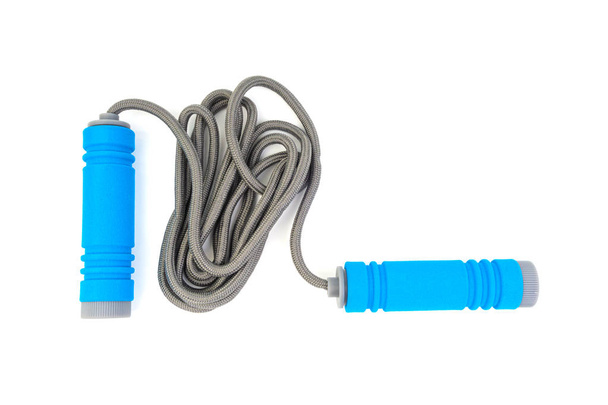 Skipping rope or jumping rope isolated on white background. Selective focus and crop fragment - Photo, Image