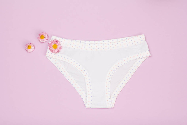 Beautiful women's cotton panties on pink background. - Photo, Image