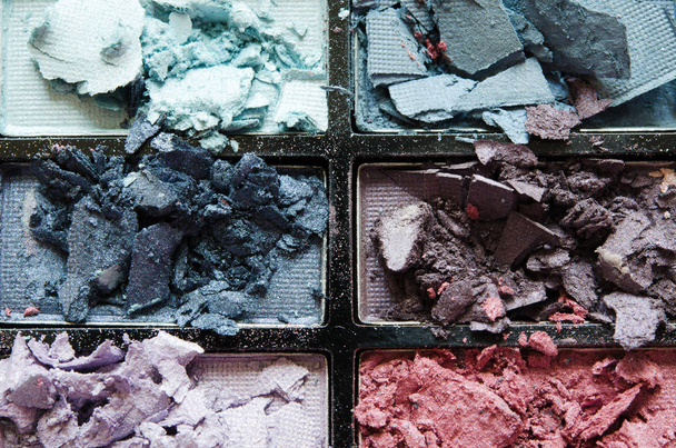 Crushed eyeshadow palette. Tool for makeup artist. The concept of fashion and beauty industry. Flat lay. Closeup. - Image - Photo, Image