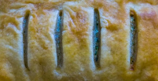 macro closeup of a french puff pastry filled with spinach, traditional foods - Photo, Image