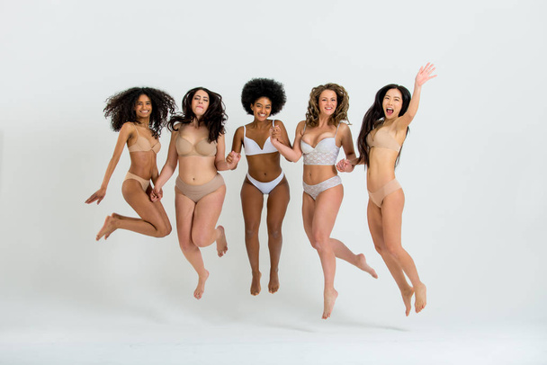 Beautiful women posing in underwear - Foto, imagen