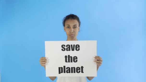 Afro-American Girl Activist With Save The Planet Poster on blue background - Footage, Video