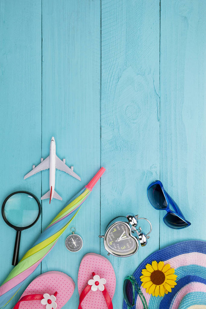 Summer objects of beautiful summer accessory on blue wooden - Photo, Image