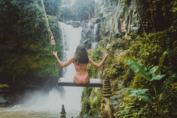Pretty girl at Tegenungan Waterfall, Bali - 写真・画像