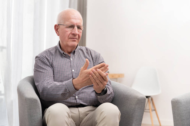 Elderly male is expressing pain - Fotó, kép