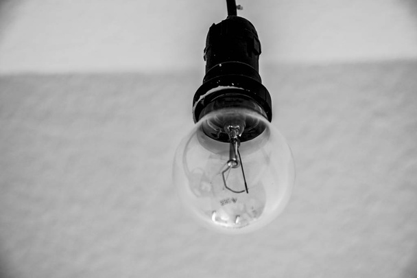 Construction socket bulb in the socket in black white - Photo, Image