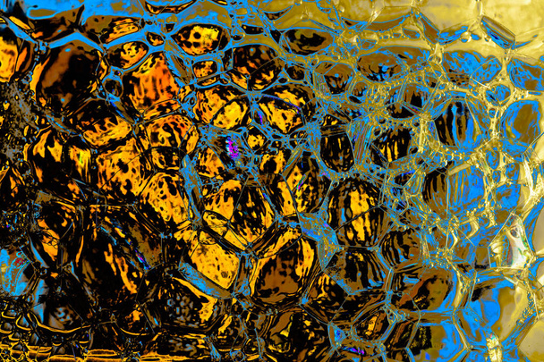 Makro laukaus vesiöljy emulsio yli värillinen tausta
 - Valokuva, kuva