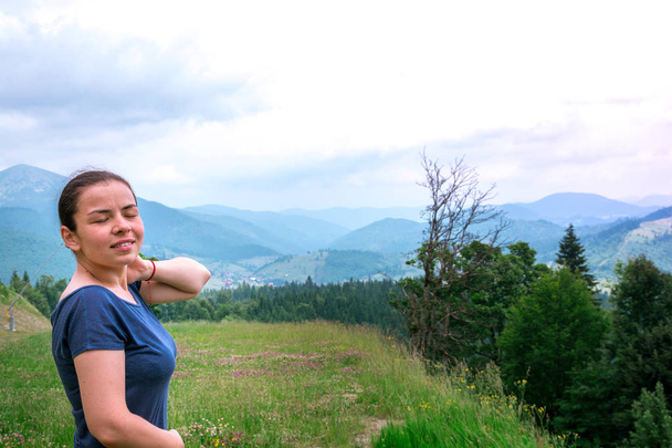 girl in forest breathe fresh air.  Mountain landscape - Photo, Image
